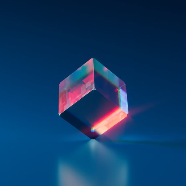 Image of a cube balancing on one of its points